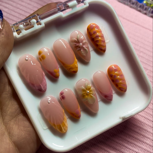 Set of coral/pink vibes press-on nails with orange and pink custom french tip. 3D Flowers, lines with pearls custom nails.