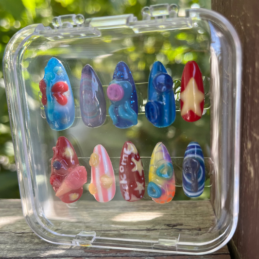 Set of coraline-themed press-on nails