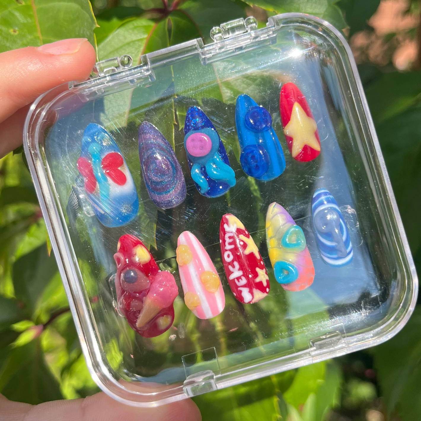 Set of coraline-themed press-on nails